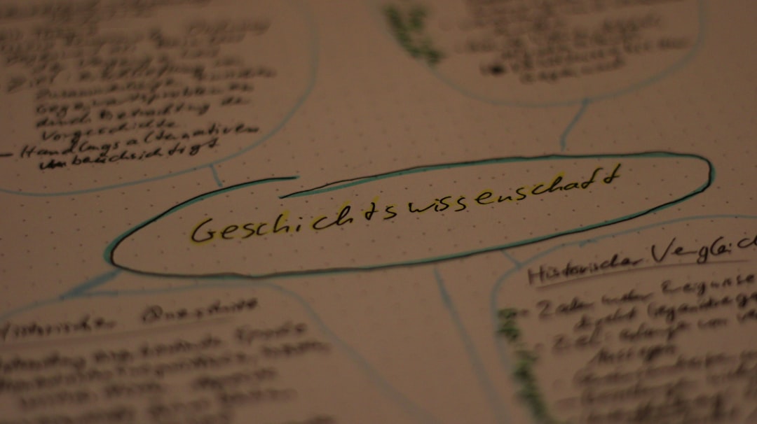 a close up of a piece of paper with writing on it