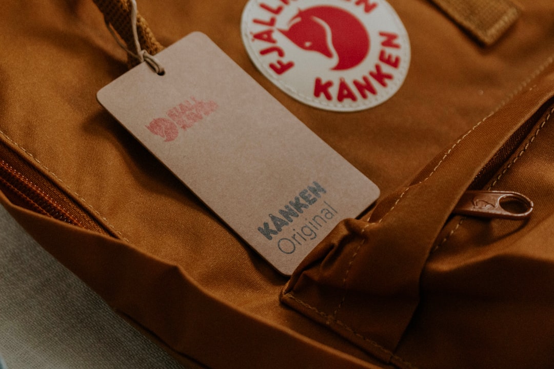 shallow focus photo of brown Kanken bag